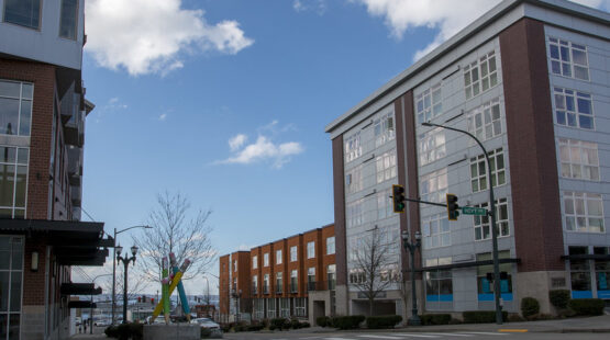 New commercial building in downtown area on sunny day